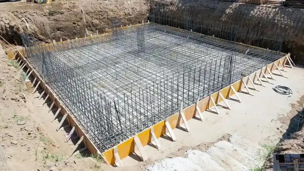 Rebar framework for a foundation under construction, showcasing types of foundation in construction.