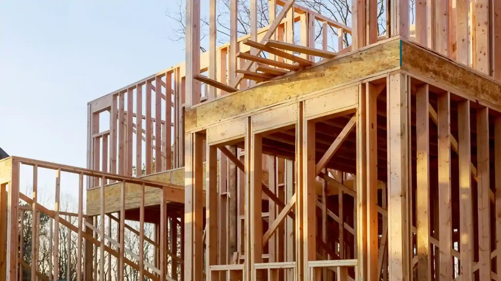 Wooden framework showing various types of beams in construction.